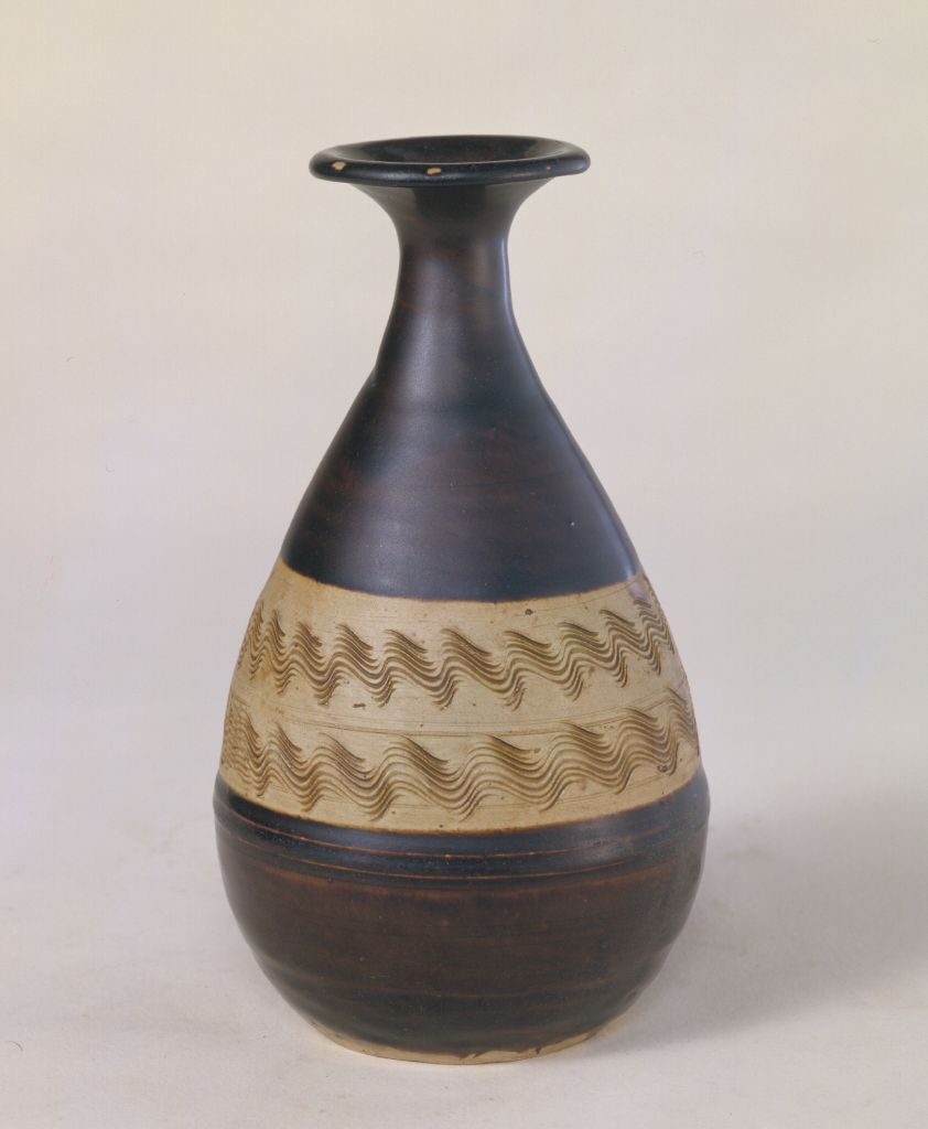 图片[1]-Black glaze carved jade pot spring vase-China Archive